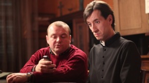 Kresimir Mikic (right) plays a priest with a plan in The Priest's Children.