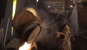 Reels of Afghani film hidden from decades of warfare and political regimes are uncovered for restoration in A Flickering Truth.