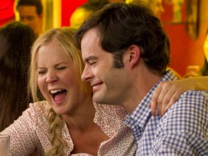 Amy Schumer and Bill Hader star as an unlikely couple in the unlikely romantic comedy Trainwreck.