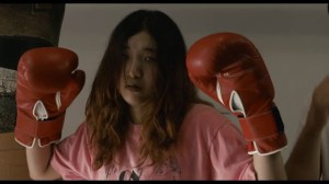 Ando sakura plays Ichiko: a slacker who suddenly has a desire to succeed at something in 100 Yen Love.